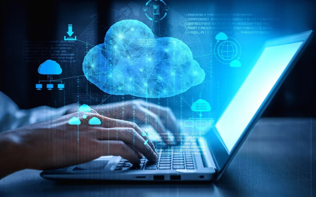 laptop with someone typing and a cloud with locks overlaying it