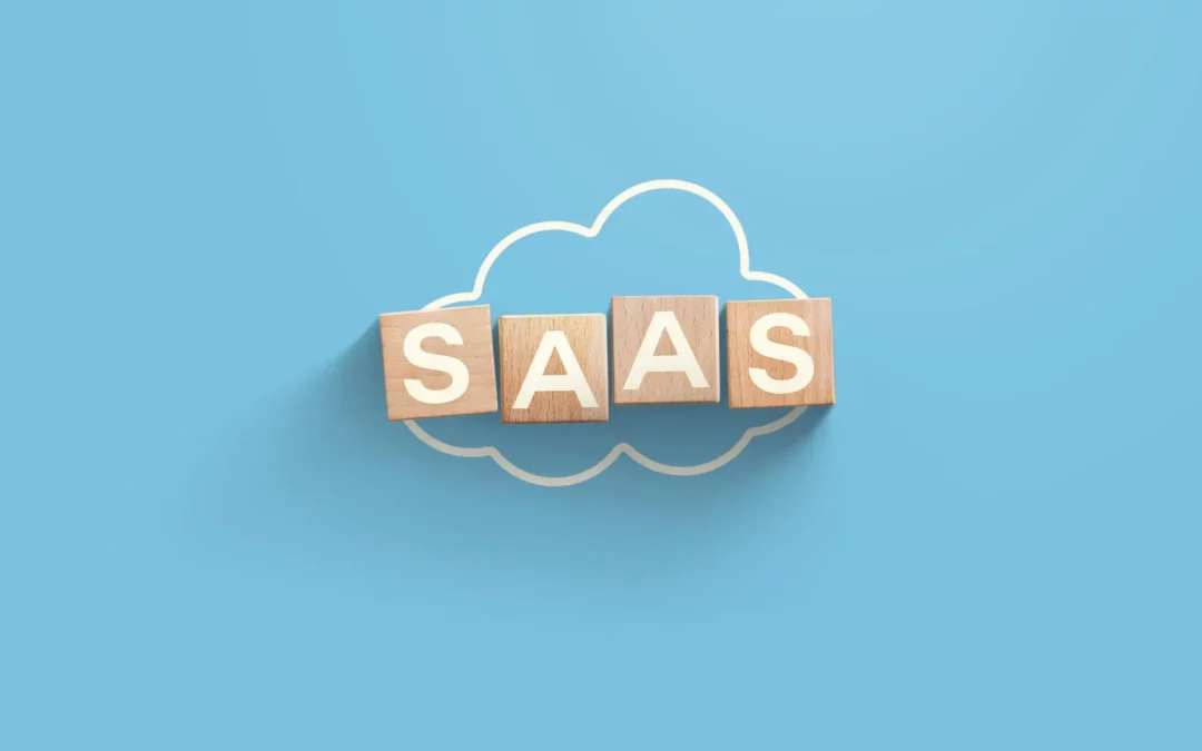 blocks spelling out saas laying on top of an outline of a cloud